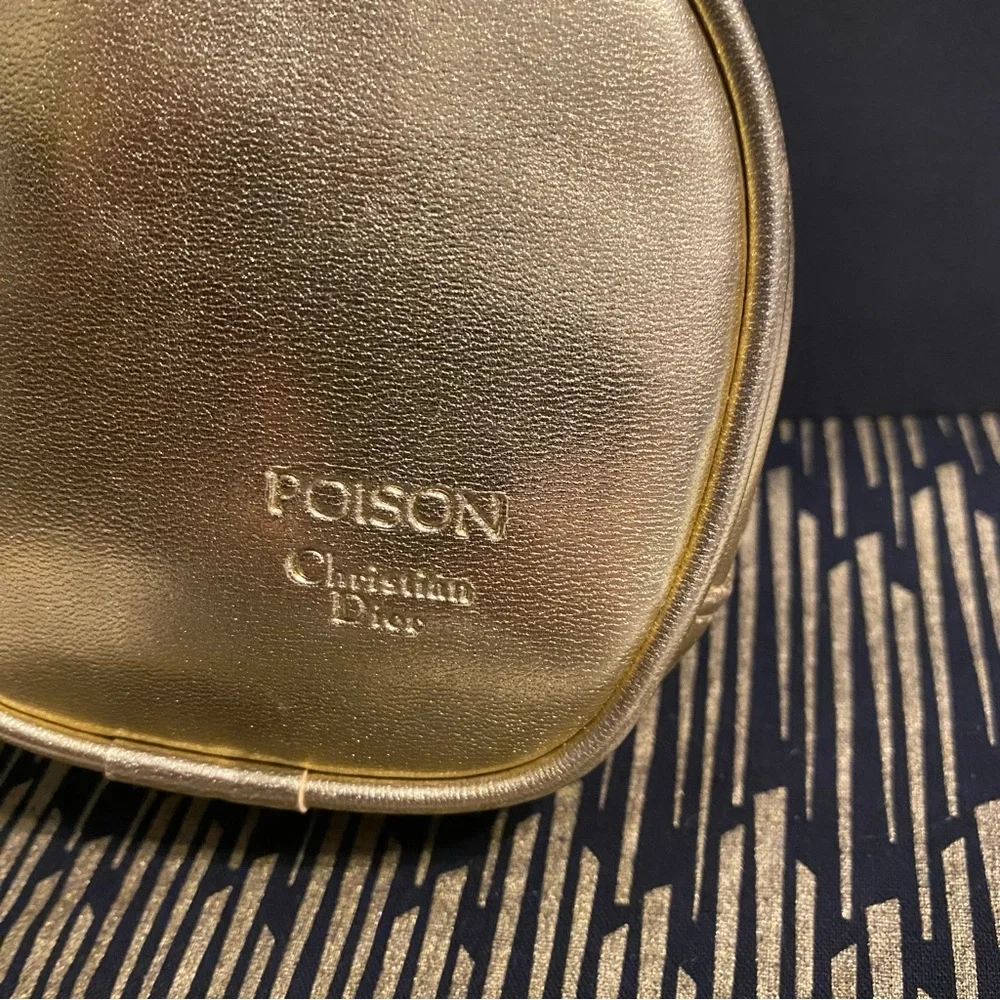 DIOR GOLD ZIPPER POUCH